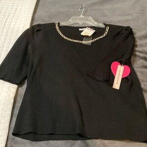 Black knit top embellished neck line